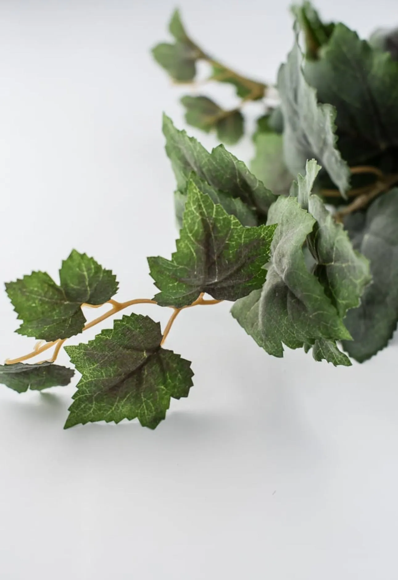 Artificial grape leaves spray