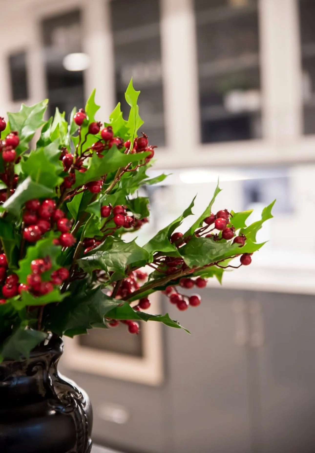 Artificial holly and red berries spray