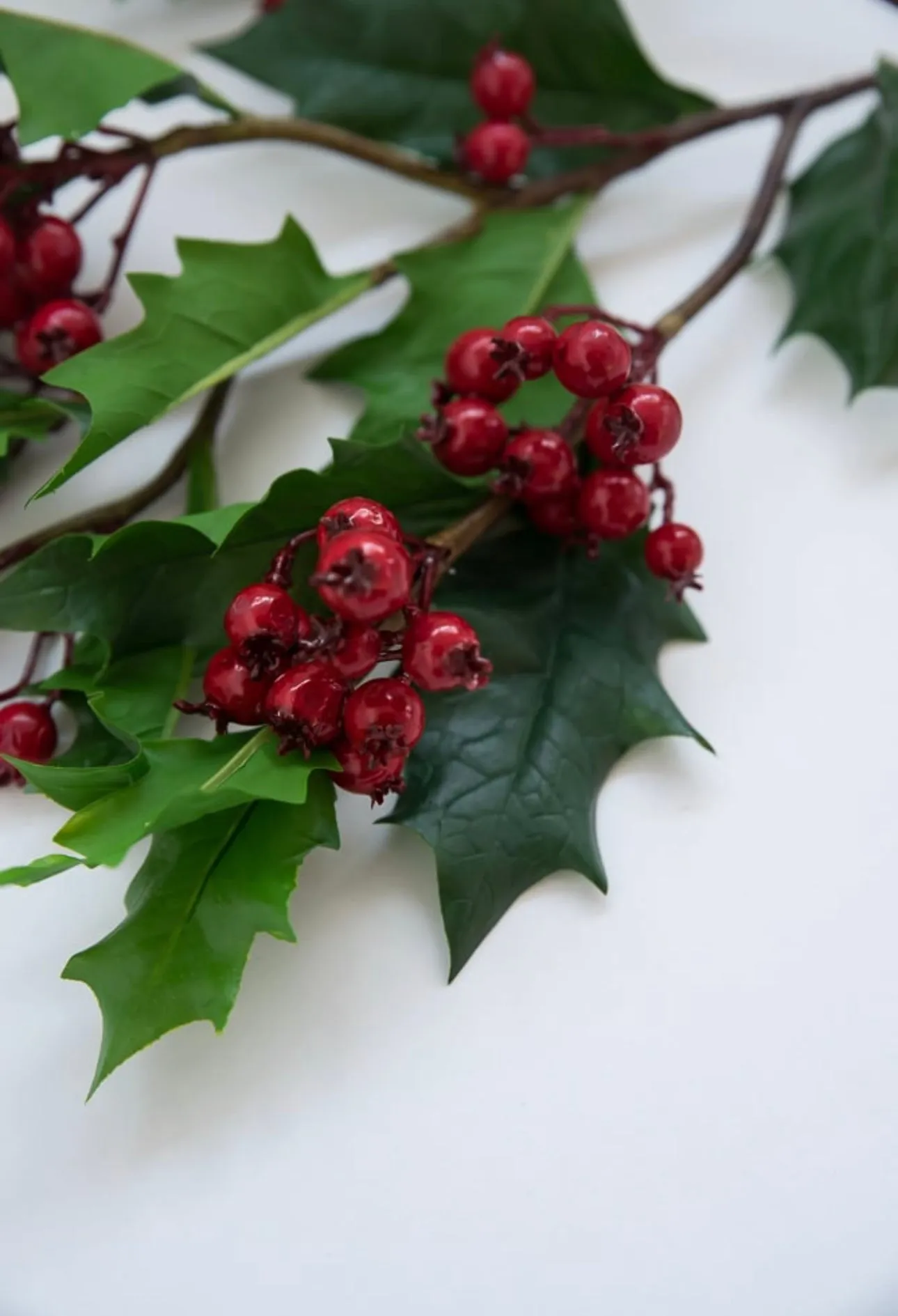 Artificial holly and red berries spray