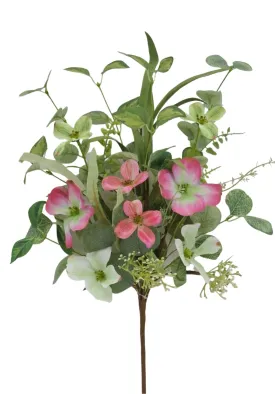 Artificial pink dogwood and greenery bush